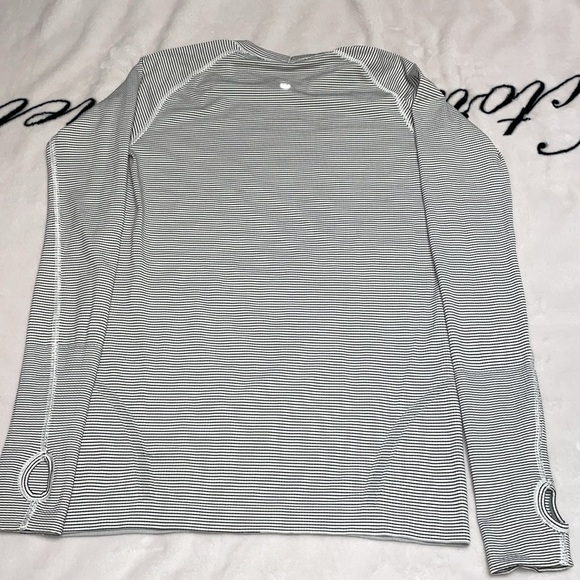 Lululemon long sleeve, no size, clean, small stain - Picture 2 of 8
